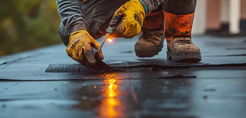 EPDM Roof Repair Tape Application in Highland Park